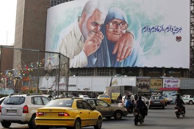 A billboard put up in Tehran this week showing IRGC commander Qassem Suleimani kissing his mother's hand. EPA