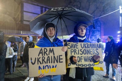 Demonstrators in front of the Russian embassy in Warsaw on November 19, 2024. AFP