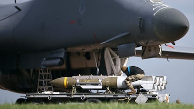 A US Air Force bomber is loaded on the tarmac at Fairford airbase in the UK. AFP