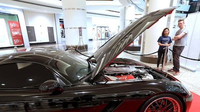 Car enthusiasts view the Viper supercar featured in the movie Fast and Furious 7. Pawan Singh / The National