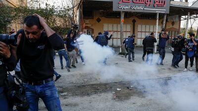 Smoke is seen during a confrontation between Israeli settlers and Palestinians in the West Bank town of Hawara. Reuters