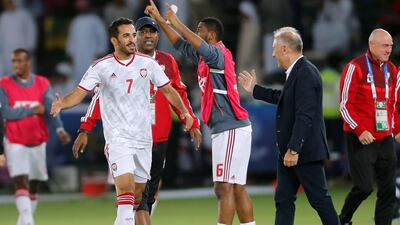 UAE manager Alberto Zaccheroni, right, congratulates striker Ali Mabkhout during their 2-0 win over India on Thursday night. Satish Kumar / Reuters