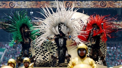Eye-catching costumes fill the stage. Reuters