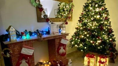 UAE resident Annabelle Kelly has made a festive fireplace out of Kibson boxes. Photos: Annabelle Kelly