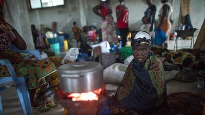 Local residents prepare meal at a temporary shelter after cyclone Idai made landfall in Sofala Province, Central Mozambique. CARE/EPA