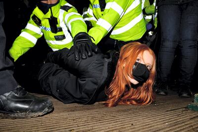 Police arrest a woman at a vigil in London in memory of Sarah Everard. Dame Cressida Dick resisted calls to resign over the Met's handling of the event. Shutterstock