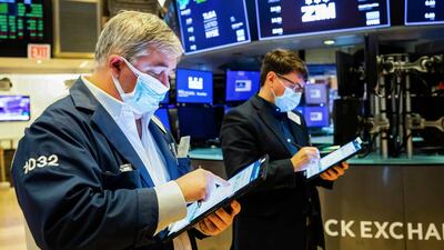 Traders work at the New York Stock Exchange. If the US Federal Reserve had not intervened, the stock market crash in March would only have been the beginning of the meltdown. Photo: AP