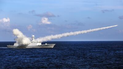 In this 2016 photo, Chinese missile frigate Yuncheng launches an anti-ship missile during a military exercise in the waters near China's Hainan Island and Paracel Islands. Tensions continue to rise between China and the US in this part of the world. AP Photo