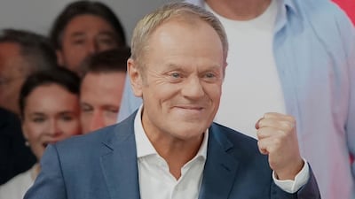 Poland's main opposition leader, former premier and head of the centrist Civic Coalition bloc Donald Tusk, addresses supporters at the party's headquarters in Warsaw. AFP
