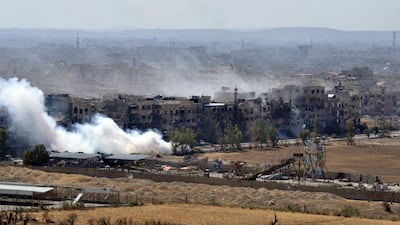 Smoke billowing from the Palestinian camp of Yarmouk during regime strikes targeting ISIS in the camp. AFP