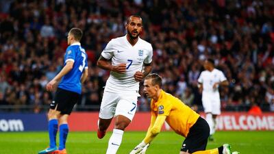 Theo Walcott of England celebrates scoring against Estonia on Friday night in a Euro 2016 qualifying match at Wembley. Clive Rose / Getty Images