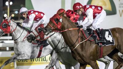 Darius Du Paon, right, wins the Group 3 Sheikh Zayed bin Sultan Al Nahyan Cup at ABu Dhabi Equestrian Club. Antonie Robertson / The National