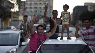Traffic packed out Gaza’s cities, with hundreds of vehicles careering around tooting horns. Mahmud Hams/AFP Photo