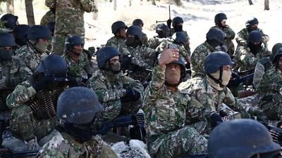 A Syrian rebel fighter takes a selfie in Idlib on September 3, 2018. AFP