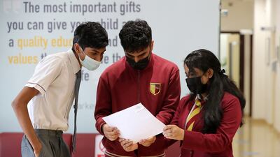 Pupils looking their A-Level results at the Cambridge International School in Dubai. Pawan Singh/The National