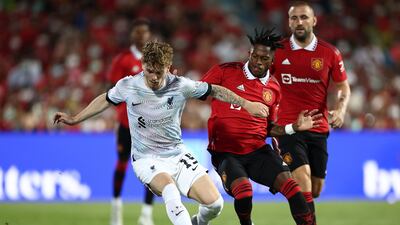 Liverpool's Harvey Elliott in action with Manchester United's Fred. Reuters