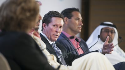 The Xylem chief Patrick Decker, shown at centre during a panel discussion in Abu Dhabi on January 20, 2015, says that using the best wastewater technology reduces carbon emissions. Mona Al Marzooqi / The National