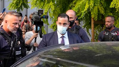 Alexandre Benalla, former security aide to French President Emmanuel Macron, leaves court on the first day of his trial in Paris on Monday. AP