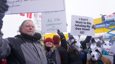 Members of People for the Ethical Treatment of Animals (Peta), protest at the Anchorage ceremonial start of the 2020 Iditarod. Reuters