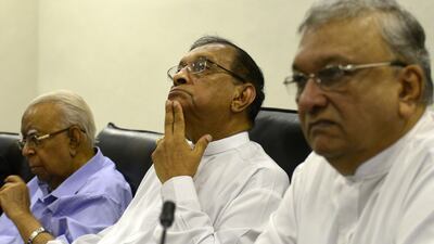 Sri Lanka's parliament speaker Karu Jayasuriya, centre, looks on at a meeting of MPs at the Parliament Building in Colombo. AFP