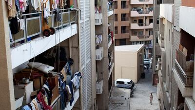A man navigates his way through a back street in the Deira area of Dubai. Christopher Pike / The National