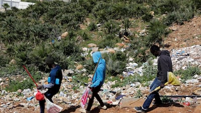 African migrants walk home, during a coronavirus lockdown at Hay el Farah on the outskirts of Rabat, Morocco. Reuters