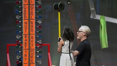 Adam Savage and with an assistant during a live-show demonstration last year in Texas. Scott Moore / Corbis
