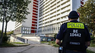 A police officer stands on guard in Berlin after Germany banned a neo-Nazi group called Hammerskins, after raids on a "skinhead elite" that allegedly used concerts as a recruiting ground for extremists. EPA