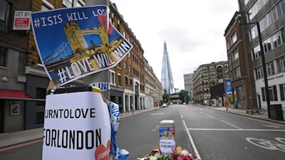 Flowers lie at a makeshift memorial on London Bridge on June 5, 2017. Facundo Arrizabalaga / EPA