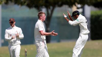 Lancashire's Chris Sanders takes the wicket of UAE's Chirag Suri in a pre season warm up game. Chris Whiteoak / The National