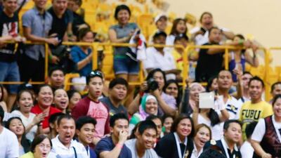 Manny Pacquiao dribbles the ball and the Filipino fans in the crowd go wild at the Al Wasl Sports Club in Dubai on Friday night. Victor Besa for The National