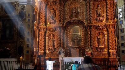 Catholic parishioners pray in the Franciscan Conventual Complex Cathedral of Our Lady of the Assumption, in the state of Tlaxcala, Mexico. The Franciscan Conventual Complex The Monastery and Cathedral of Our Lady of the Assumption of Tlaxcala, central Mexico, has been listed as a Unesco World Heritage site.
