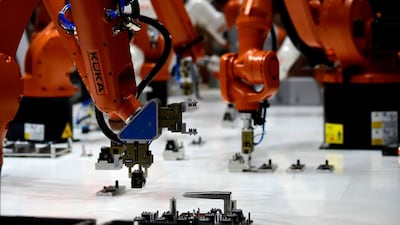 Kuka robots in Hanover, Germany. The EU wants to create a network of innovation hubs to develop AI capabilities and uptake. Tobias Schwarz/AFP