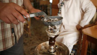 cafe owners argue that getting rid of the hookah on their menus would be so detrimental to revenues that they would possibly shut down. Ryan Carter / The Nation