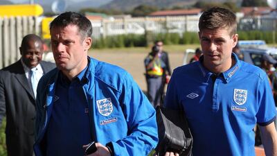 Jamie Carragher, left, and Steven Gerrard, shown here before an England friendly in 2010, played many years together at Liverpool. AFP PHOTO / PAUL ELLIS