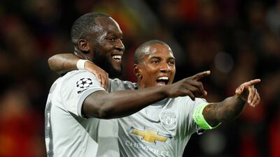 Manchester United's Romelu Lukaku celebrates scoring their third goal with Ashley Young. John Sibley / Reuters