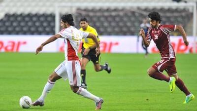 Hamdan Al Kamali, right, has a contract with Al Wahda up to 2014, but has expressed his desire to play in Europe.