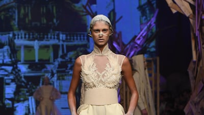 A touch of tailoring was introduced with wide-leg trousers layered underneath soft trains. Getty Images