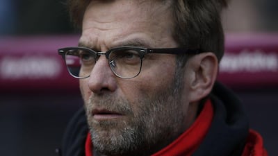 Liverpool's German manager Jurgen Klopp watches his players warm up ahead of the English Premier League football match agaisnt Aston Villa on February 14, 2016. (AFP)