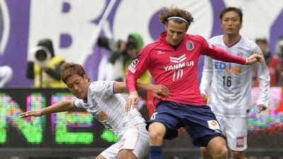 Diego Forlan, centre, was substituted after 81 minutes of his J-League debut for Cerezo Osaka in the 1-0 defeat to Sanfrecce Hiroshima. AP Photo