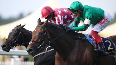 Baghdad, ridden by Ryan Moore, left, wins the Duke of Edinburgh Stakes. Press Association