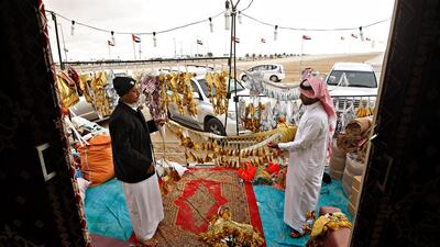 Amina Khatu,22, holds her son Ahmed, 2, inside a thatched hut at a crowded IDP camp November 25, 2012 on the outskirts of Sittwe, Myanmar. Paula Bronstein / Getty Images