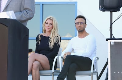 Britney Spears and talent manager Larry Rudolph in 2017. Getty Images