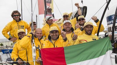 Abu Dhabi Ocean Racing pose with the UAE flag after winning the Volvo Ocean Race in-port series on Saturday in Gothenburg, Sweden. Ian Roman / Abu Dhabi Ocean Racing