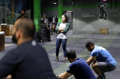 Nuha Al Marri coaches at Crossfit Metalise. Pawan Singh / The National