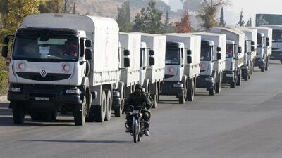 A convoy of aid from the Syrian Arab Red Crescent leaves the capital Damascus for the besieged rebel-held Syrian town of Madaya on January 14, 2016. Louai Beshara / AFP