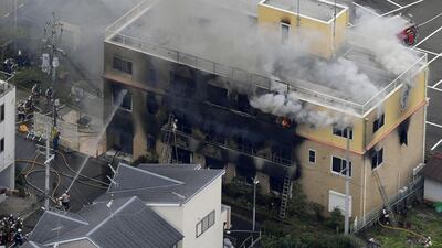 An aerial view shows firefighters battling the blaze at a three-story studio of Kyoto Animation Co. in Kyoto, western Japan Kyodo/via Reuters