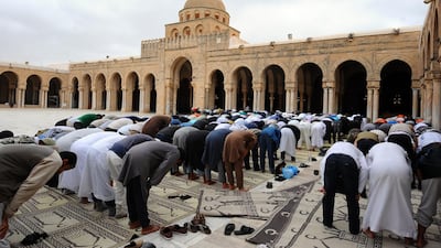 Worshippers pray at Great Uqba Mosque in Kairouan, Tunisia, which draws the faithful from across the Middle East and North Africa during Ramadan. AFP