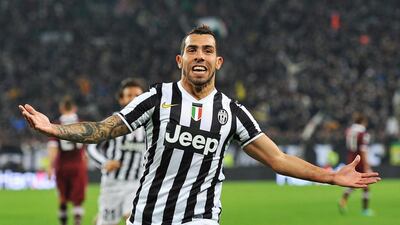Carlos Tevez scored 19 goals and assisted on seven for Juventus in 33 Serie A matches this season. Di Marco / EPA