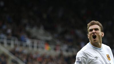 Hull City's Nikica Jelavic celebrates after scoring a goal against Newcastle United during their EPL match on Saturday. Andrew Winning / Reuters